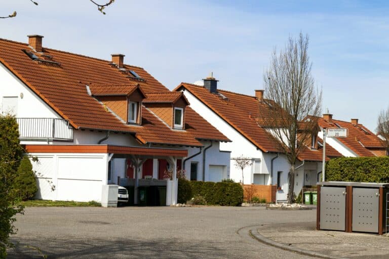 Classic german residential houses with orange roofing tiles and windows